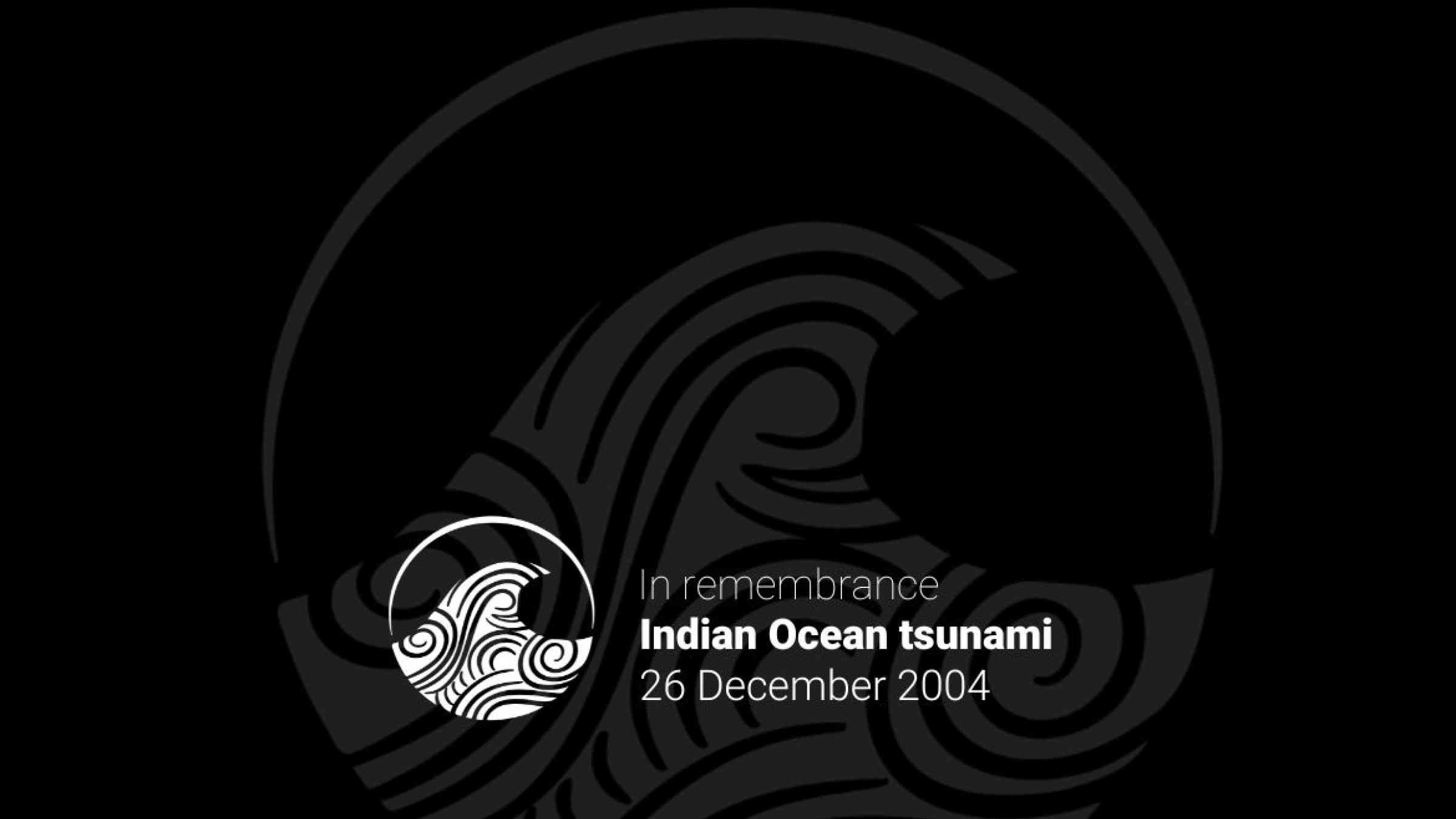 Tsunami 2004 remembrance day card with a black background and the message written in white