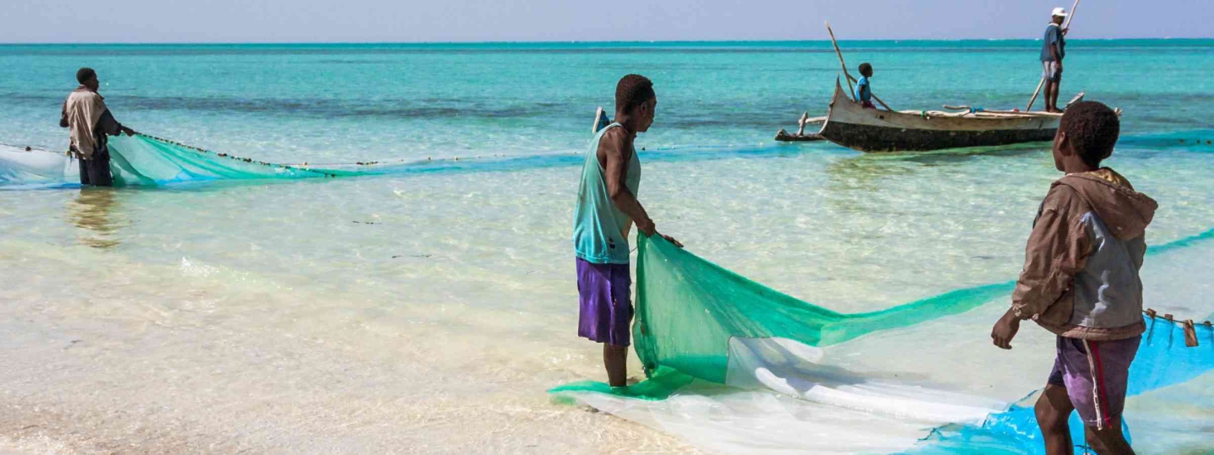 Six fishermen and their fishing net in the Salary lagoon, southwestern Madagascar on July 22, 2016